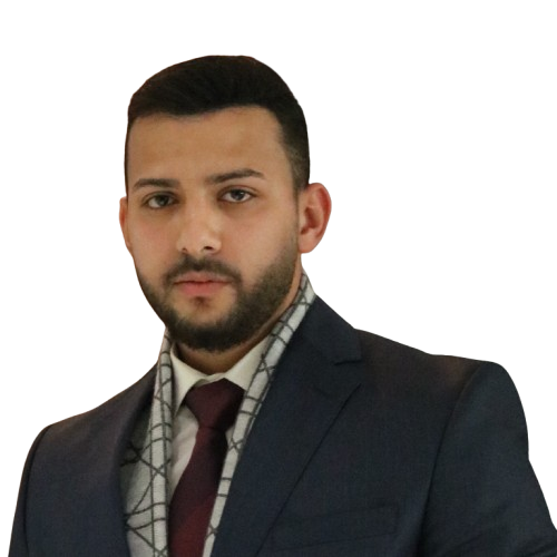 Professional portrait of a man in a navy suit, burgundy tie, and checkered scarf, facing the camera.