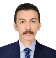 Professional headshot of a man in a navy suit and blue striped tie.