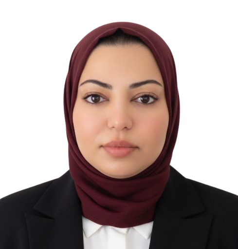 Portrait of a woman wearing a maroon hijab and black blazer, looking straight at the camera with a neutral expression.